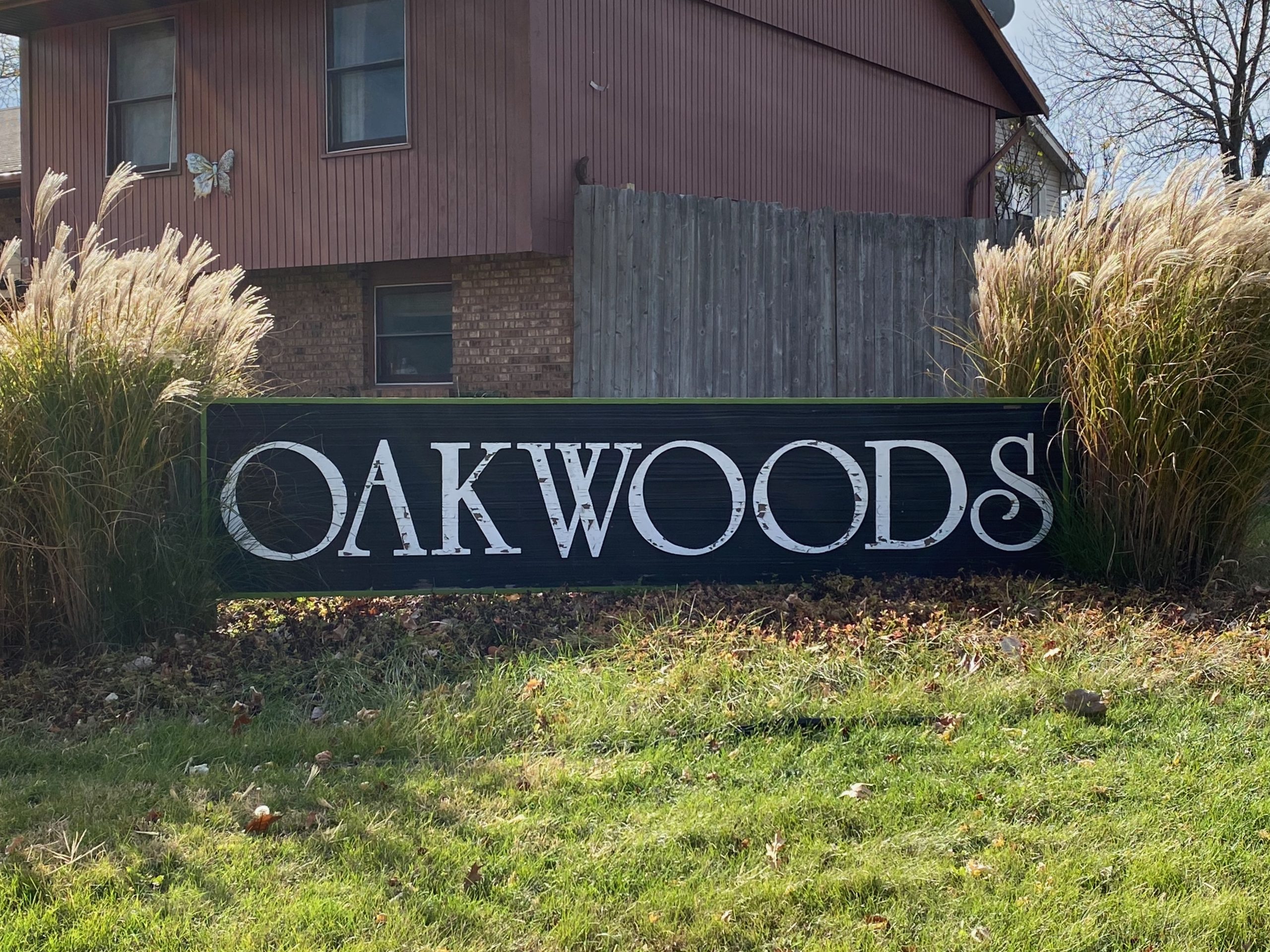 Sign at entrance of Oakwoods subdivision, Bloomington, IL.